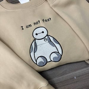 他の人はこちらも検索 Baymax Hoodie - Etsy Clothing