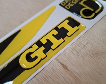 2 x GTI wing emblems - Yellow base w/ Black
