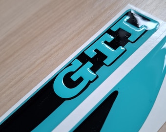 2 x GTI wing emblems - Teal Base w Black