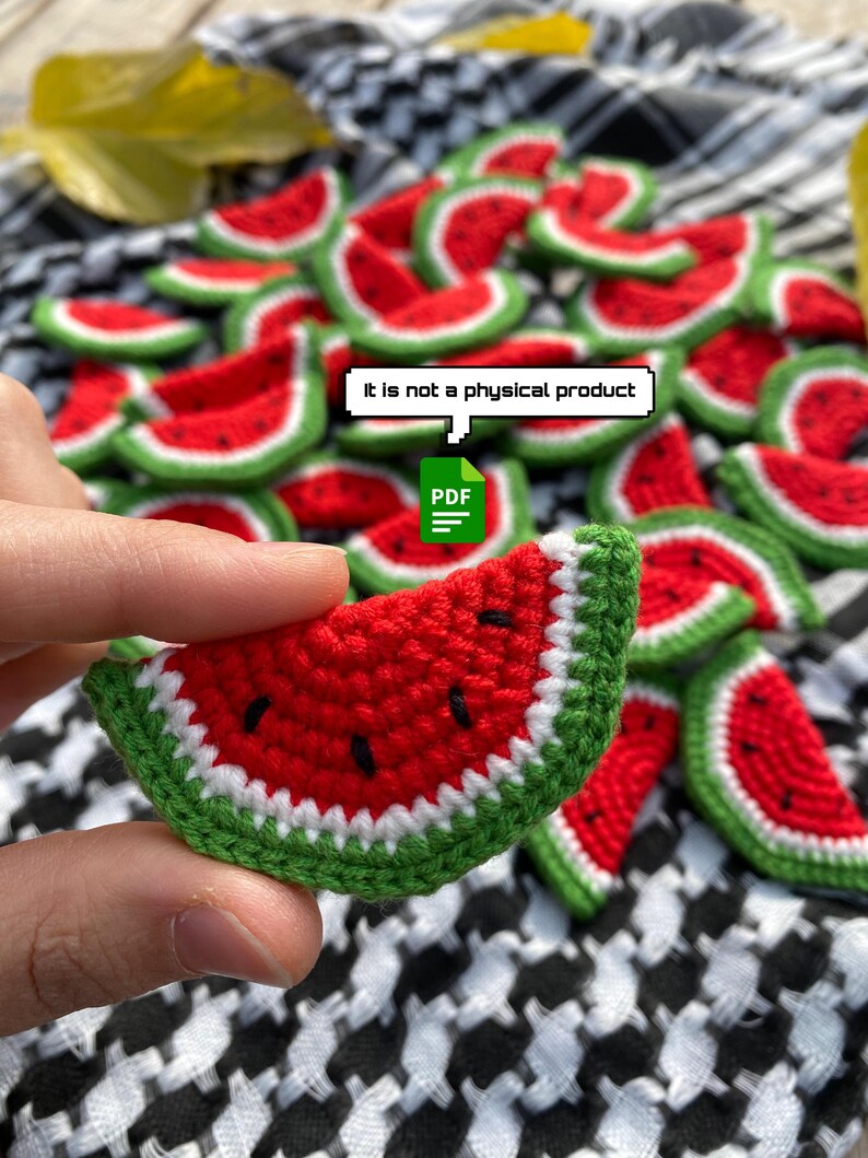 May include: A PDF pattern for crocheting watermelon slices. The pattern includes instructions for making the slices in red, green and white yarn. The image shows a hand holding a finished crocheted watermelon slice.