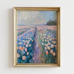 May include: Oil painting of a tulip field in pink, white, and blue hues, framed in a gold-coloured wooden frame. The artwork shows a path through the flowers towards a distant treeline under a cloudy sky. The painting evokes a sense of tranquility.