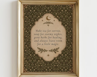 May include: A framed wall art print featuring a dark olive green background with a repeating floral vine pattern. A central cream-colored scalloped label contains the text: Make tea for sorrow, soup for stormy nights, grow herbs for healing, and always leave room for a little magic. The design includes a crescent moon, stars, and leaf motifs.