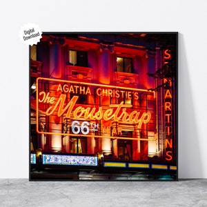 Digital File London St. Martin&#39;s Theatre neon sign of Agatha Christie&#39;s The Mousetrap across an Victorian architecture style buiding