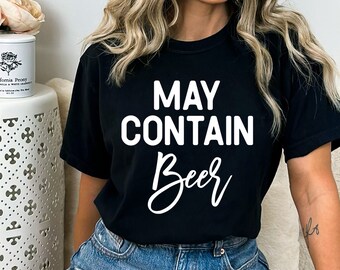 May include: A black t-shirt with white text that reads "May Contain Beer".