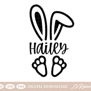 May include: Black and white bunny ears with the name Hailey written underneath.  Two small black footprints are below the name.