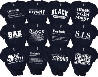May include: Twelve navy blue t-shirts with white text and graphics. The shirts feature phrases like "Black Girl Magic", "Bae Black and Educated", "Growth", "Melanin", "Period", "My History is Strong", "Young Gifted and Black", "One Month Can't Hold Our History", "Black Mixed With", and "S.I.S. Successful Intelligent Sistam".