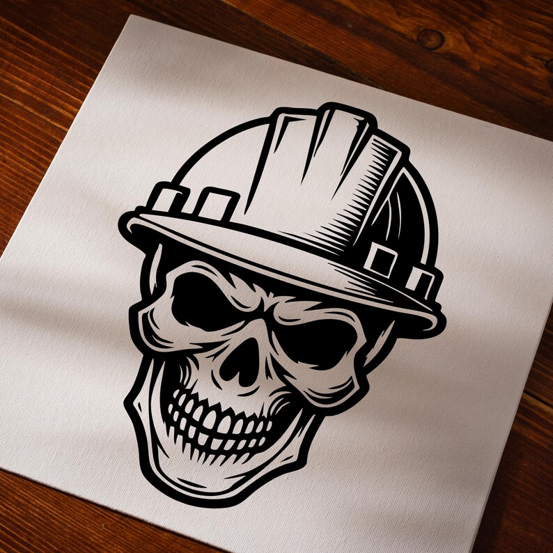 May include: Black and white illustration of a skull wearing a hard hat. The skull has a menacing expression with a toothy grin.