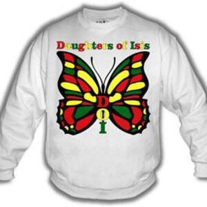 May include: White sweatshirt with a large butterfly design in red, yellow, green, and black. The words "Daughters of Isis" are printed above the butterfly in red, yellow, and green. The letters "DOI" are in the center of the butterfly.