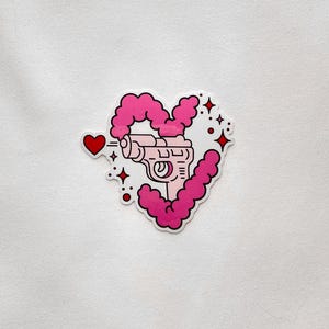 Sticker liefdespistool | Transparante glanzende vinylsticker | Waterdichte vinylsticker | Kindle-sticker, laptopsticker, girly esthetiek