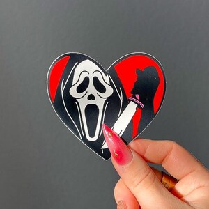 Sticker coeur masqué (rouge) | Autocollant imperméable en vinyle brillant | Sticker Kindle, sticker pour ordinateur portable, journal indésirable