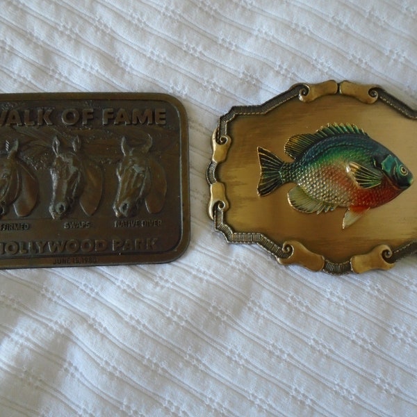 Mens  Lot of 2 Brass Belt Buckles Walk of Fame Hollywood Park 1980 & Raintree "Perch" 1977 or 1978