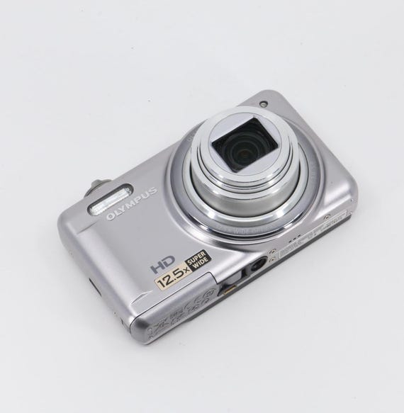 Olympus VR-325 Digital Camera + Hama Case, Strap, Battery, SD