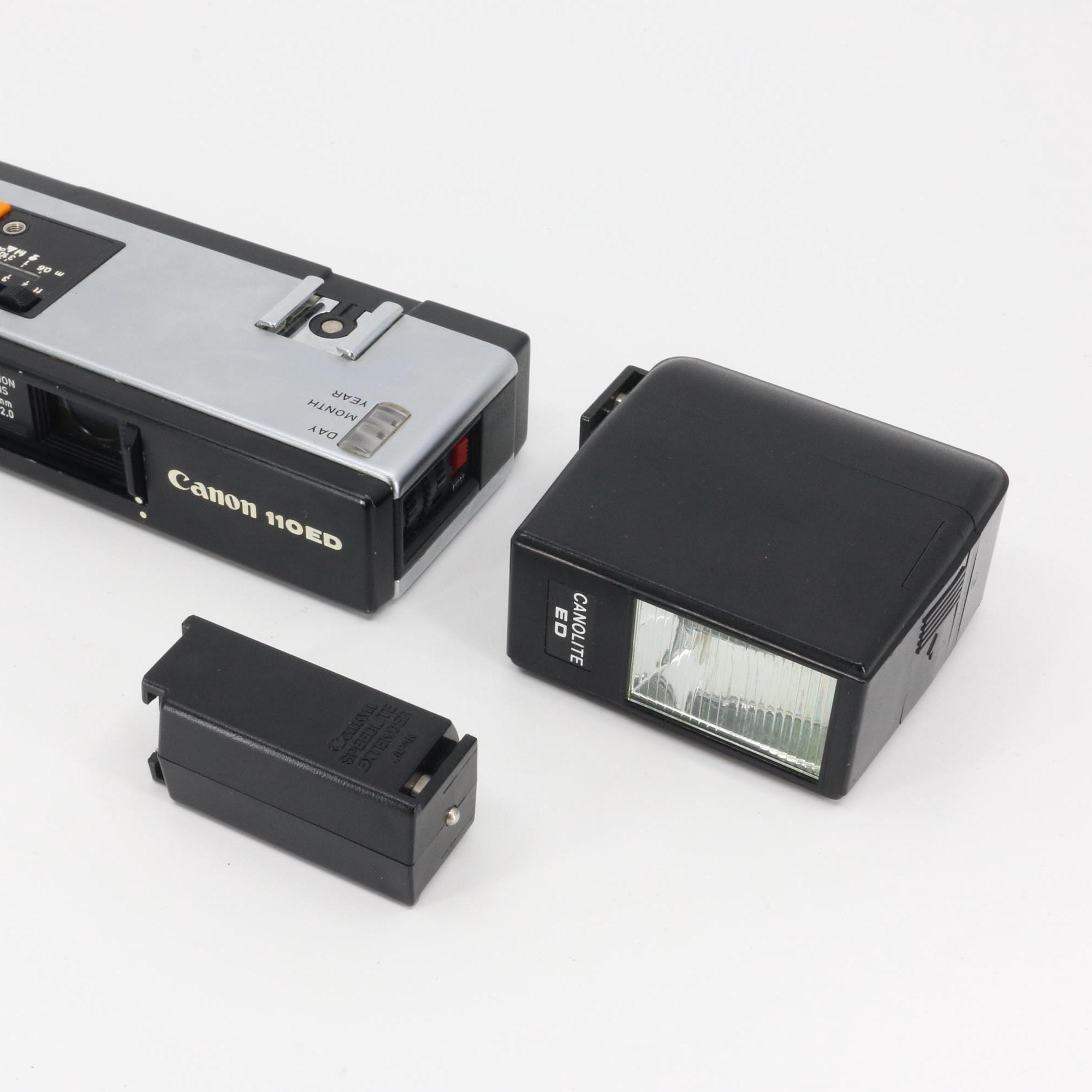 Leotax フィルムカメラ & Canon 110ED 本体セット READ Canon 110ED Film Camera Set 110 (date Function Does Not Work