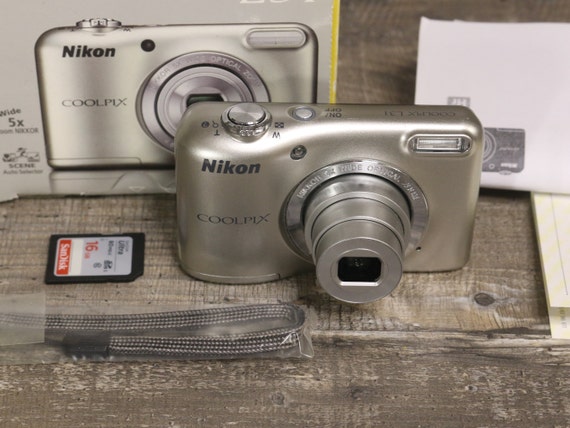 Boxed Nikon Coolpix L31 Digital Camera With Strap, Manual and SD