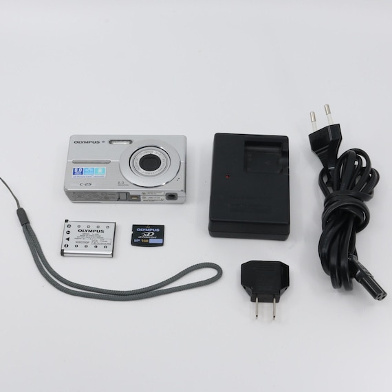 Olympus C-25 Compact Digital Camera + XD Memory Card, Strap