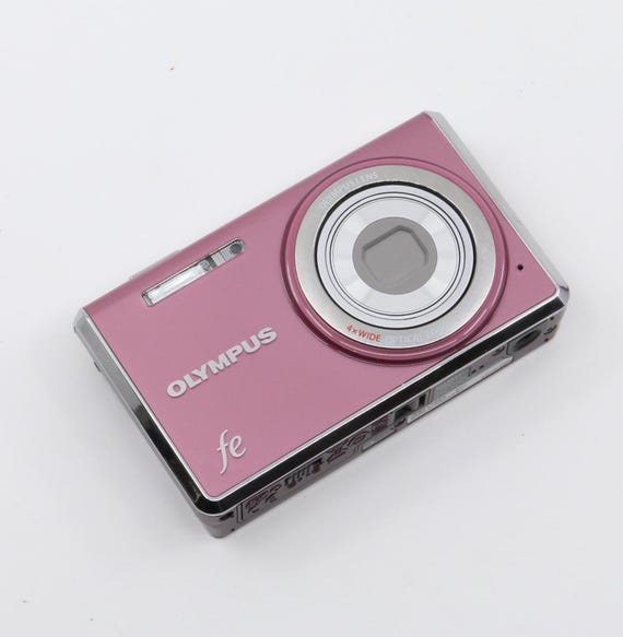 OLYMPUS FE-5030 コンパクトデジタルカメラ ピンク 動作品 OLYMPUS FE-5030 コンパクトデジタルカメラ ピンク 動作品の通販はau