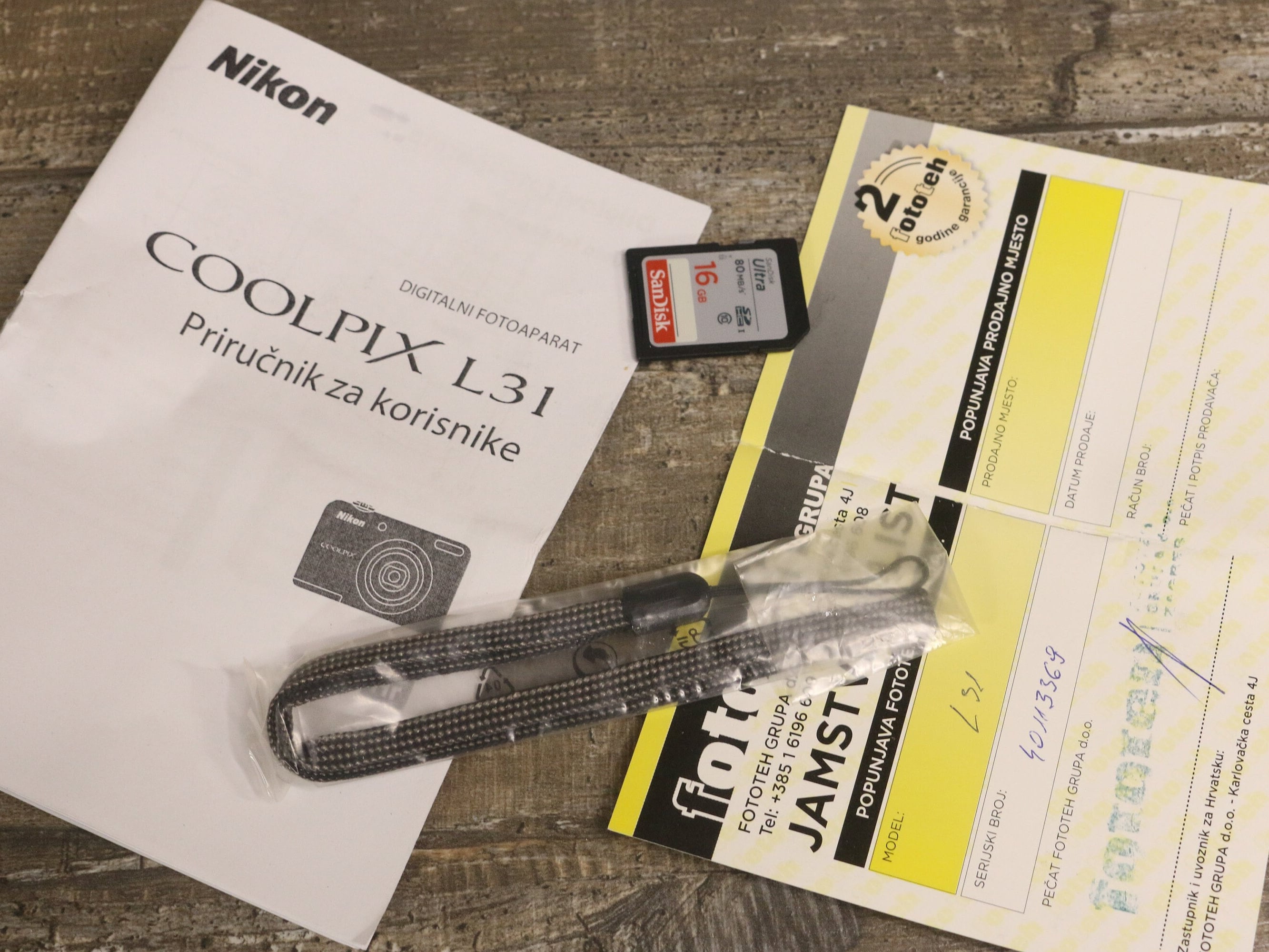 Boxed Nikon Coolpix L31 Digital Camera With Strap, Manual and SD