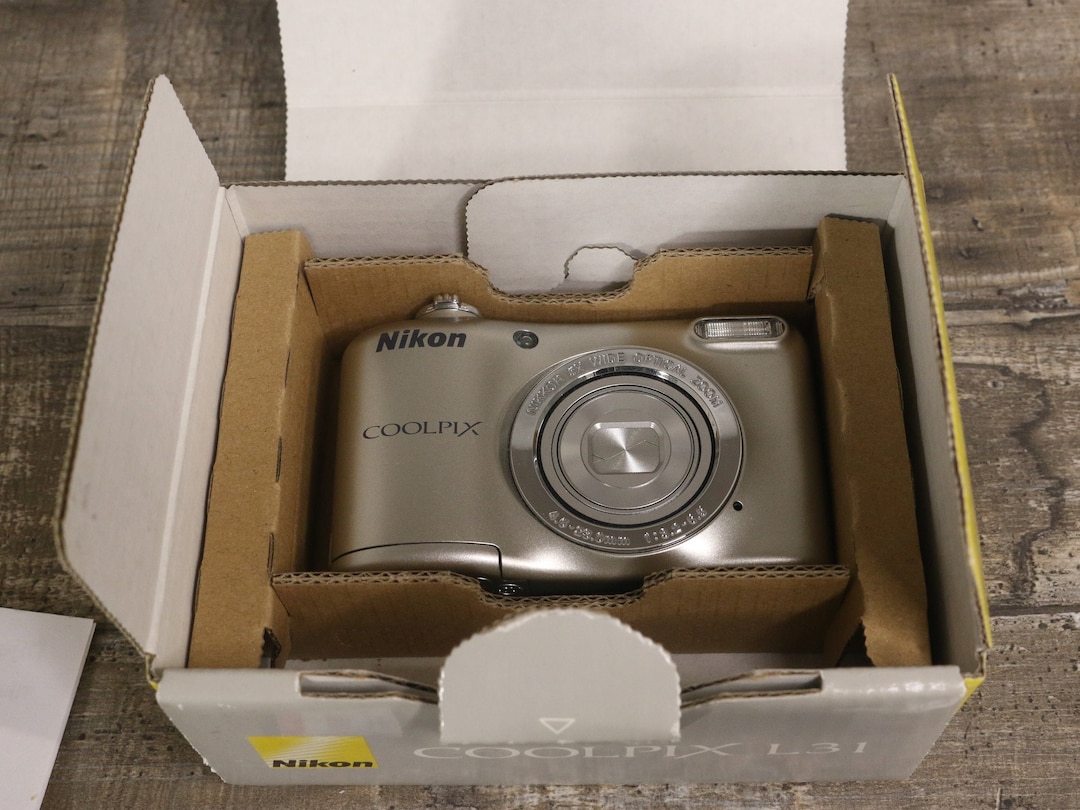 Boxed Nikon Coolpix L31 Digital Camera With Strap, Manual and SD