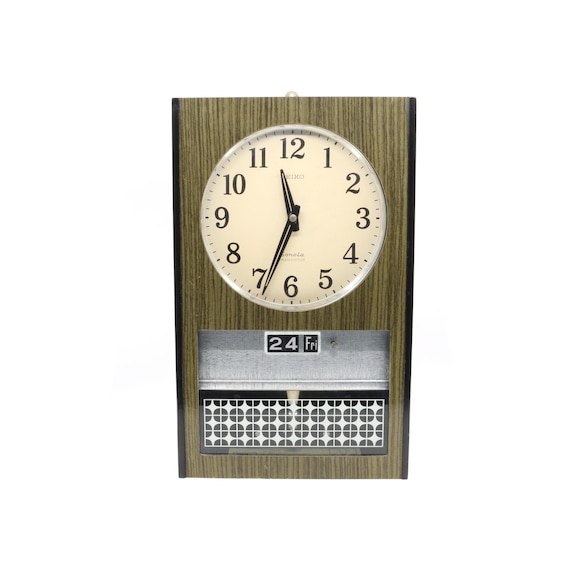 Seiko Sonola Transistor Date Electro-magnetic Pendulum Wall Clock