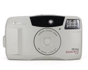 Canon Prima Zoom Shot Ai AF 35mm Film Camera (few scratches on front of camera)