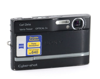 Sony Cyber-shot DSC-T9 Super SteadyShot with Battery, Charger (Worldwide adapter) and Memory Card *shows signs of use*