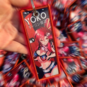 Yoko Anime Embroidered  Jet Tag Keychain