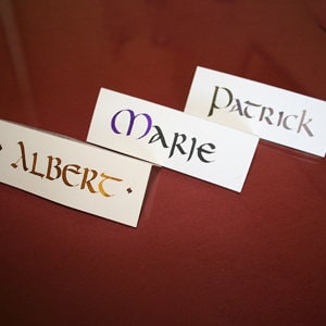 Marque-place calligraphié - 2 plis