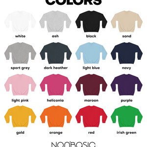 May include: A color chart showing 16 different sweatshirt colors. The colors are: white, ash, black, sand, sport grey, dark heather, light blue, navy, light pink, heliconia, maroon, purple, gold, orange, red, and irish green. The text "COLORS" is at the top of the chart and the text "NONBASIC" is at the bottom of the chart.