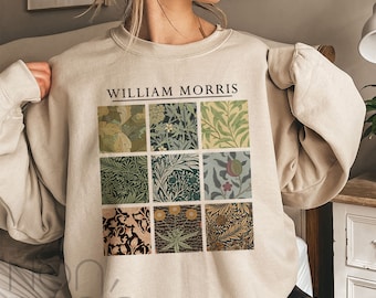 May include: A beige sweatshirt with a graphic print of a collage of nine different floral patterns. The text "William Morris" is printed above the collage.