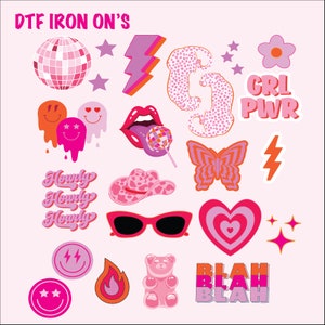 May include: A collection of DTF iron-on transfers in a retro, groovy style. Designs include a disco ball, lightning bolts, smiley faces, lips with a lollipop, a cowboy hat, sunglasses, a butterfly, a heart, and text that says "Howdy", "Girl Power", and "Blah Blah".