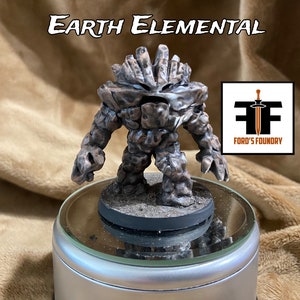 May include: A detailed miniature Earth Elemental figurine, with a textured, rocky appearance in shades of brown and grey. The figure stands on a circular base. The image includes the text "Earth Elemental" and a logo for Ford's Foundry.
