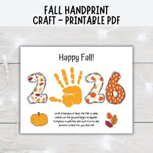 May include: A printable PDF craft sheet featuring the text Happy Fall and a poem. The design includes the number 2026 with a yellow handprint replacing the zero. The numbers feature autumn patterns, and there is a pumpkin and colorful leaves.