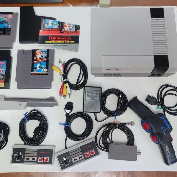 Nintendo NES System with Console, Controllers, Cables and Game, Cleaned, Tested, Works Like New, and Verified Fully Functional