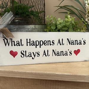 What happens at Nana’s stays hand painted sign Nana grandmother Christmas gift