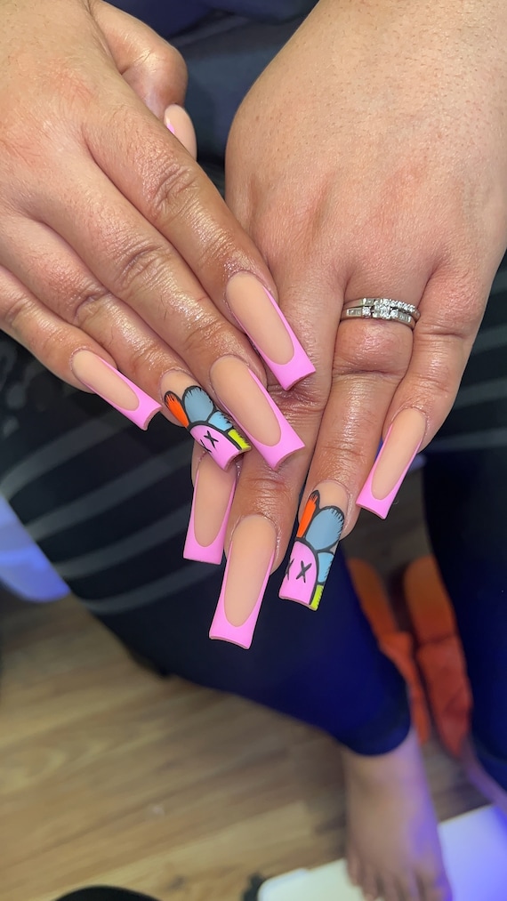 Short Pink Kaws Press on Nails With Gold Charms 