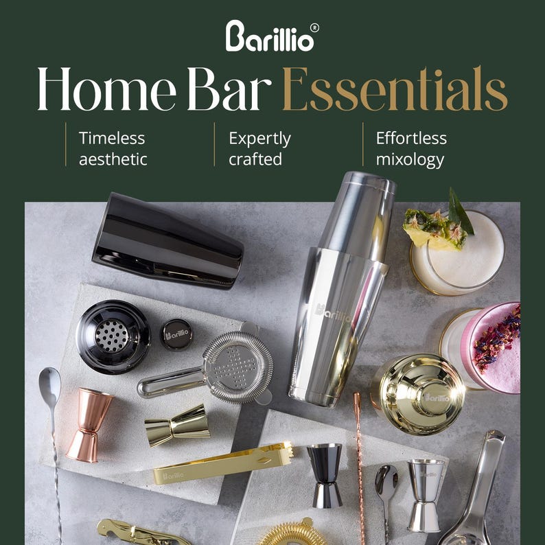 May include: A collection of bar tools, including a black shaker, a silver shaker, a strainer, jiggers, and a bar spoon. The image features the text "Home Bar Essentials" and "Barillio" branding. The tools are arranged on a light gray surface.