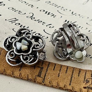 Floral Motif Silver Tone Clip-On Earrings with Mother of Pearl Pieces in Resin and Black Rhinestone Accents
