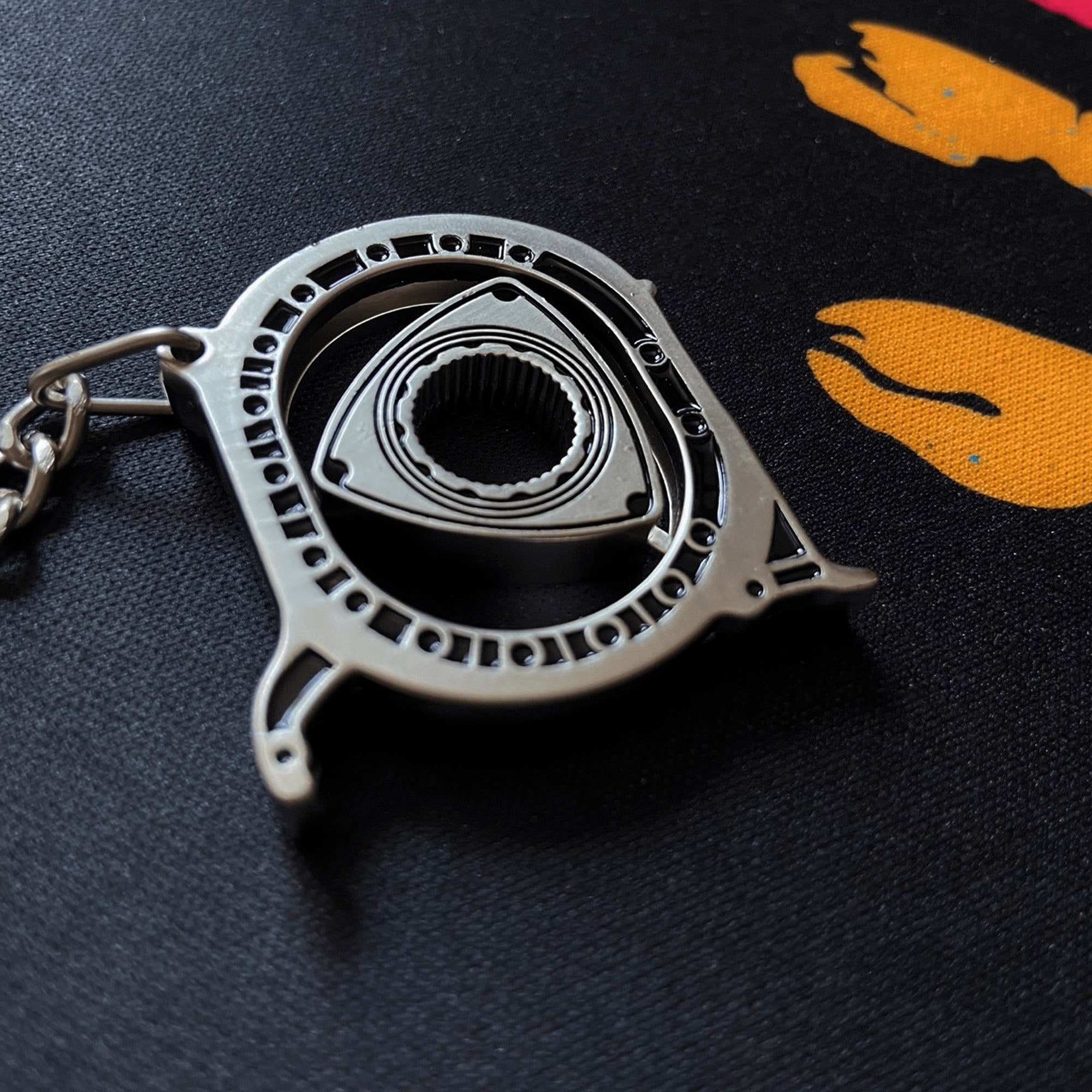 Rotary clearance engine keychain