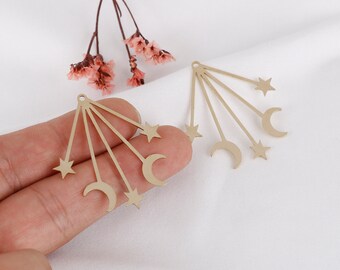 May include: Two gold-toned metal earring charms with a star and crescent moon design. Each charm has five rays extending from the top, with a star and crescent moon at the end of each ray.