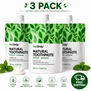 May include: Three-pack of NatShop natural toothpaste pouches. Each white pouch has green leaf designs and the words "NATURAL TOOTHPASTE". The toothpaste is fluoride-free, lab-tested for heavy metals, and contains vitamin E and mint essential oil. Each pouch contains 100 ml / 3.38 fl oz.
