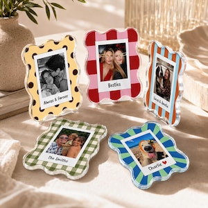 May include: Five wavy-edged acrylic photo frames featuring various patterns including yellow with brown dots, red and pink stripes, orange and blue stripes, green gingham, and blue and green sunbursts, each displaying a custom photo and text.