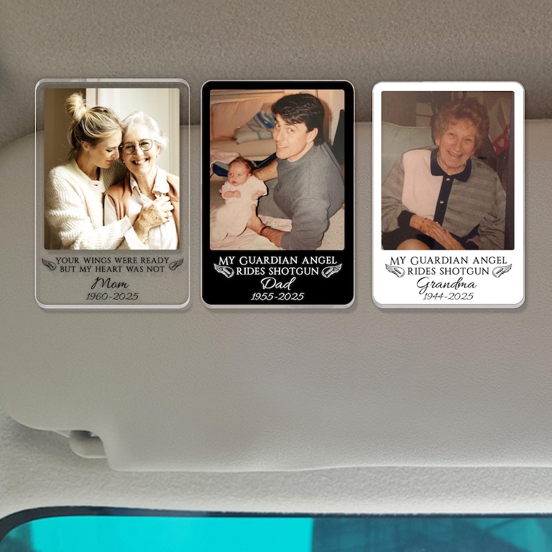 May include: Three memorial car visor clips with photos of loved ones. Each clip has a different photo and text: "Your wings were ready but my heart was not Mom 1960-2025", "My guardian angel rides shotgun Dad 1955-2025", and "My guardian angel rides shotgun Grandma 1944-2025".