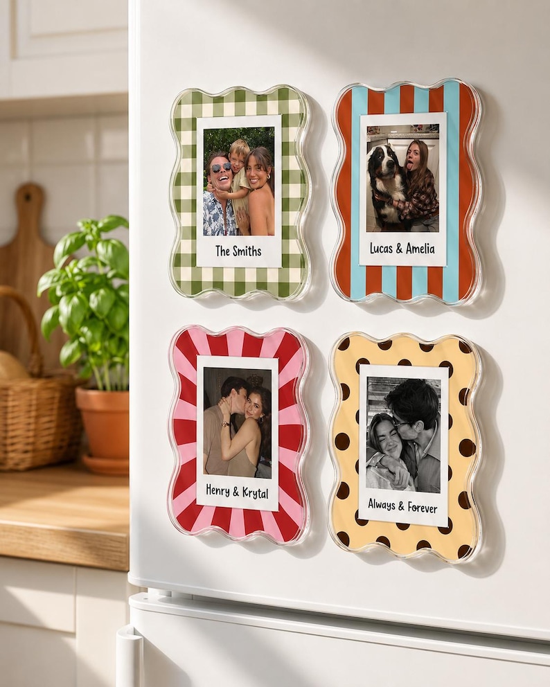 May include: Four rectangular magnetic photo frames with wavy edges, featuring green gingham, red and blue stripes, pink and red sunbursts, and yellow with brown polka dots. Each frame displays a photograph and text: The Smiths, Lucas & Amelia, Henry & Krystal, and Always & Forever.