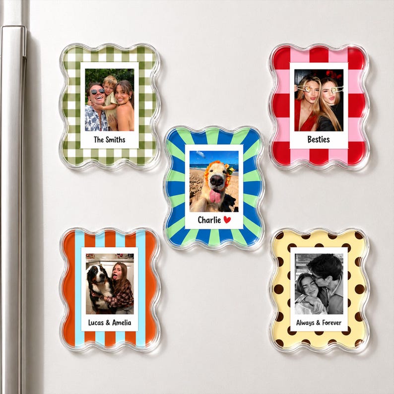 May include: Five rectangular photo magnets with wavy edges, each featuring a unique pattern: green gingham, red stripes, blue and green sunburst, orange stripes, and yellow with brown polka dots. Each magnet displays a custom photo and text.