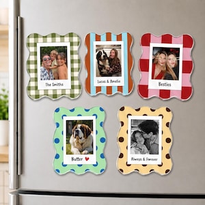 May include: Five scalloped-edge rectangular photo magnets with various patterns and colors. Each frame holds a square photograph and features printed text: The Smiths, Lucas & Amelia, Besties, Butter with a red heart, and Always & Forever.