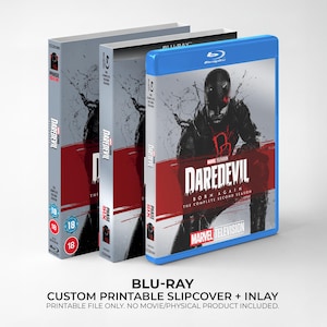 May include: Three Blu-ray cases featuring the Marvel Television series "Daredevil: Born Again." The cases are in shades of gray, red, and blue, with the title prominently displayed. The text "Blu-ray" and "Custom Printable Slipcover + Inlay" are also visible.