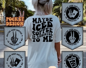 May include: A white t-shirt with a black graphic that says "Maybe Iced Coffee Is Addicted To Me" in a retro font. The graphic is surrounded by four black and white patches with the same text and a skeleton hand holding a coffee cup.