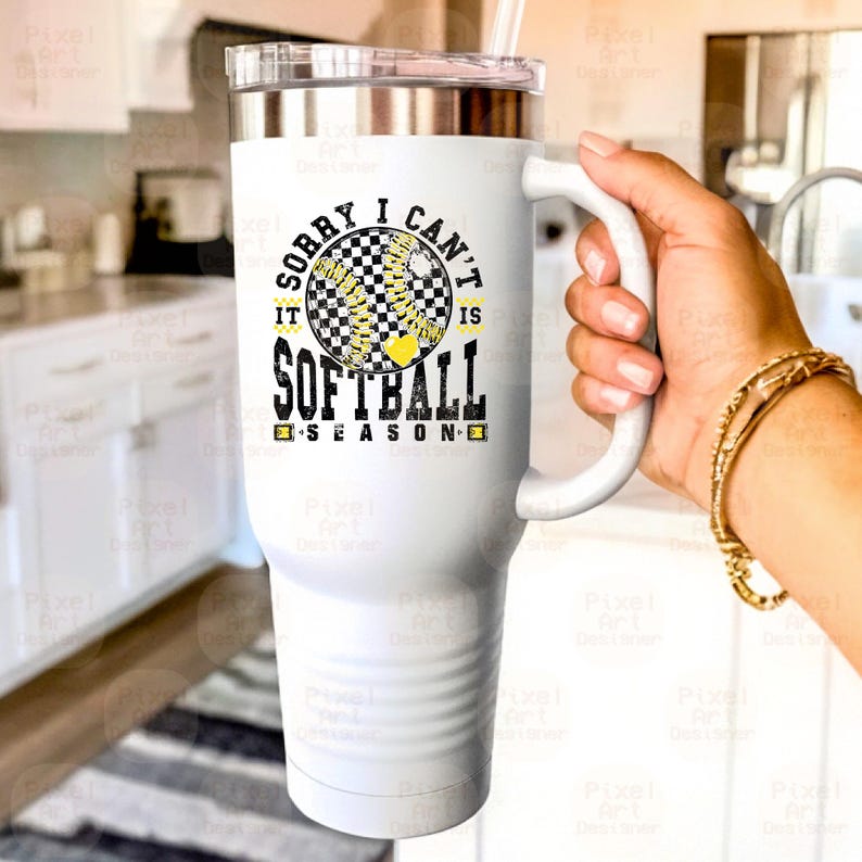 May include: White stainless steel tumbler with a black and yellow softball graphic and the text "Sorry I can't it is softball season".