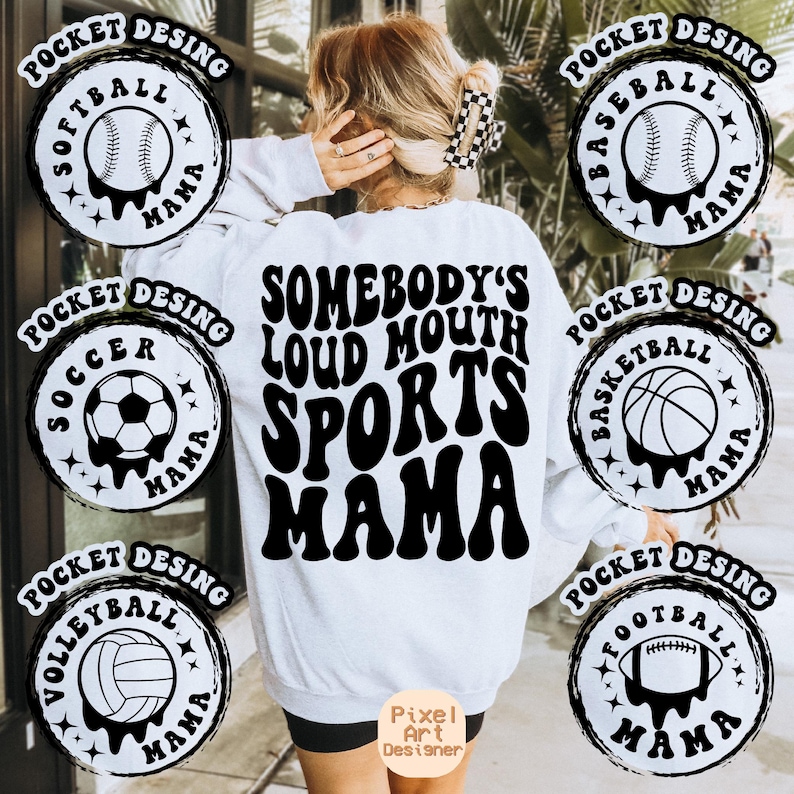 May include: White sweatshirt with black text that reads "Somebody's Loud Mouth Sports Mama".  The sweatshirt has seven black and white circular designs around the edges, each with a different sport ball and the text "Pocket Desing" and "Mama".