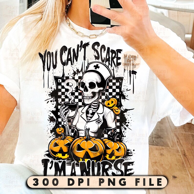 May include: White t-shirt with a Halloween-themed graphic. The design features a skeleton in a nurse's uniform holding a coffee cup, surrounded by pumpkins. Text reads "YOU CAN'T SCARE I'M A NURSE" and "300 DPI PNG FILE".
